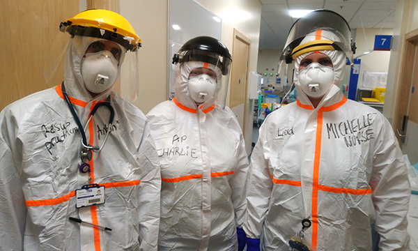 Picture shows nursing staff starting a shift in the resuscitation room at Medway Maritime Hospital wearing personal protective equipment.