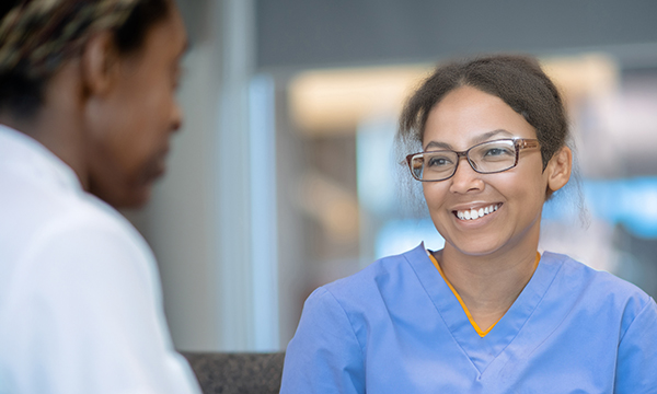 STAR method in nursing: nurse engages happily in work conversation 