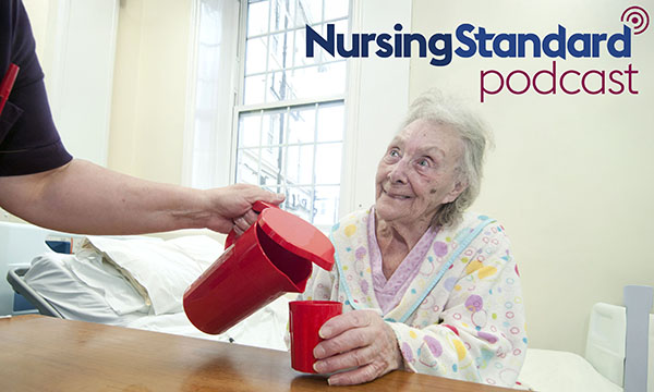 Managing dehydration: nurse giving water to patient