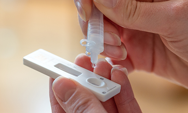 Someone using a lateral flow test for COVID-19: such tests will no longer be needed for symptomatic nurses in England, unless they work with more vulnerable patients, from 1 April