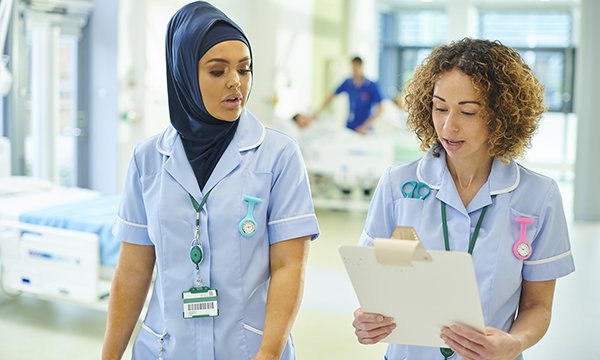 Picture of two female medics, one of whom is wearing a hajib