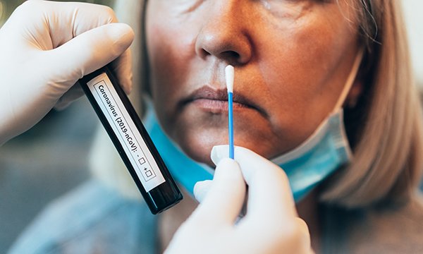Woman being swab-tested for coronavirus