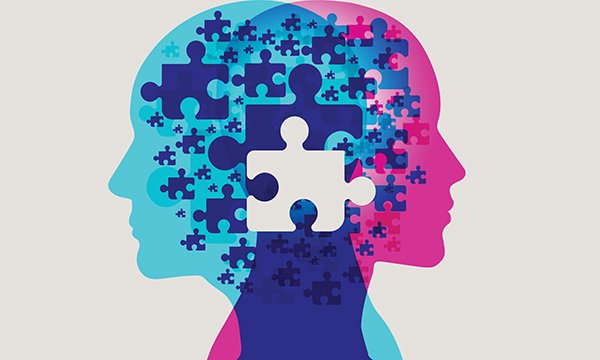Illustration showing pieces of a puzzle in two heads. People with a personality disorder often face exclusion from effective treatment