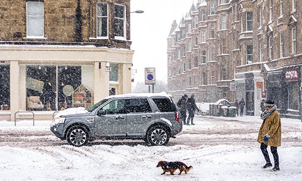 A 4x4 car in snowy weather. NHS trusts have revealed emergency travel plans for staff this winter 