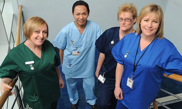 Nurses in Wales have been wearing standardised uniforms for some time ...