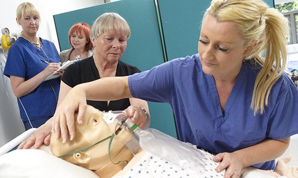 Picture shows a training session with the use of a manikin