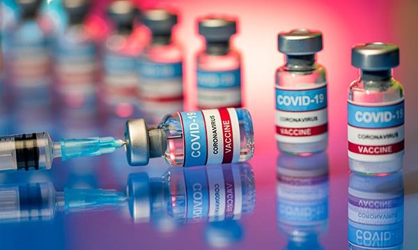 Picture shows vials of COVID-19 vaccine