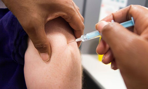 Picture shows a vaccination being carried out