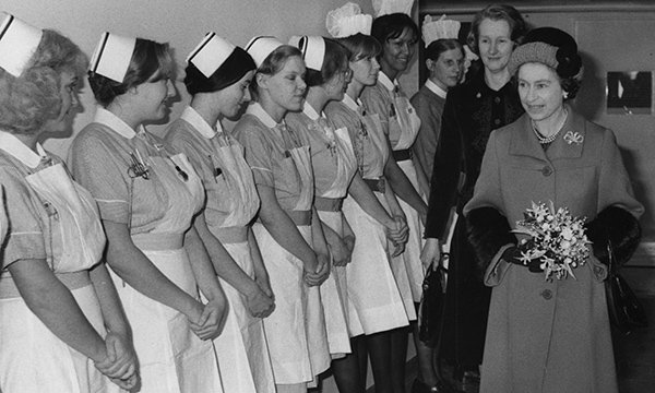 Nurses make a guard of honour at St Thomas’ Hospital in London, where Queen Elizabeth II opened the 14-storey North Wing in 1976