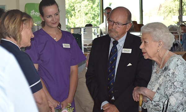 Clinical nurse specialist Julie Harley (left) meeting the Queen