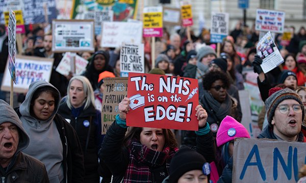 Striking nurses marching through London to Downing Street