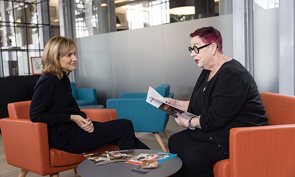 Presenter Fiona Bruce listens to comedian Jo Brand reminisce about her former career as a mental health nurse in south London