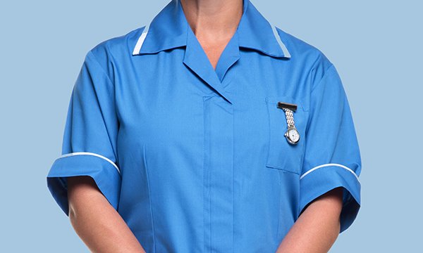 Picture of  the torso of a nurse wearing a blue uniform