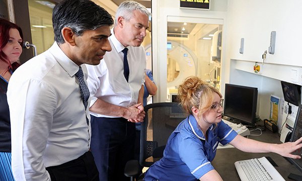 Prime minister Rishi Sunak and health and social care secretary Steve Barclay observe nurses at work