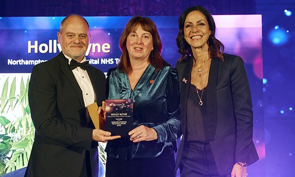 RCN professional lead in infection, prevention and control Rose Gallagher receives the greener practice award on behalf of Holly Slyne. Ms Gallager is pictured with award presenter Rodney Morton and RCN Nursing Awards 2023 host Julia Bradbury