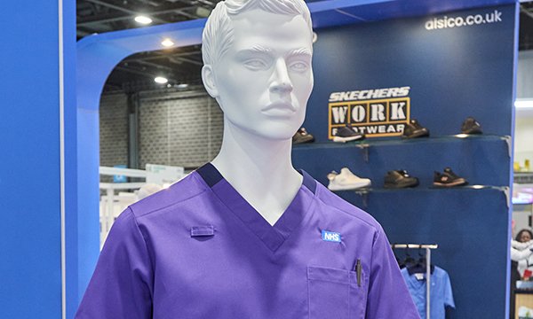 A male uniform on a mannequin in dark purple