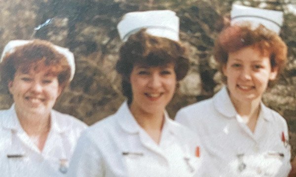 Patricia Dawson, centre, in her days as a nurse