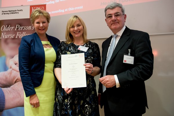 Director of Health Education England (HEE) Professor Lisa Bayliss-Pratt and chair of HEE Keith Pearson present Geraldine Rodgers, centre, with an award for best project