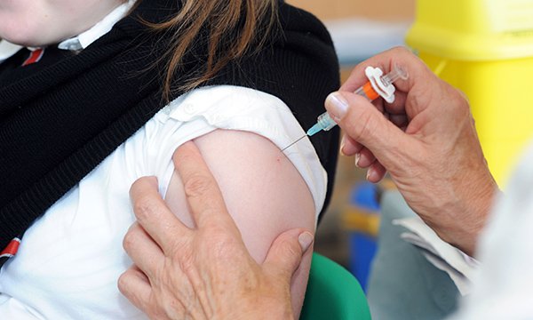 Picture shows a school nurse giving a girl the HPV vaccination. Vaccinations for children a new screening method that looks for traces of HPV and could result in cervical cancer being eliminated, the NHS says.