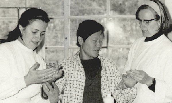Picture shows Austrian nurses Marianne Stoger (left) and Margaritha Pissarek with a patient