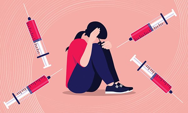 Illustration of a young woman with learning disabilities who is needle-phobic and scared of vaccinations