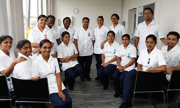 A group of overseas-trained nurses at Salford Royal NHS Trust in 2019