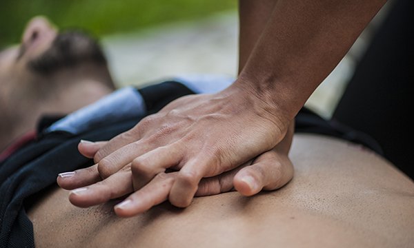 Someone performing CPR on another person. The RCN says guidance on CPR will be updated to give nurses clearer direction