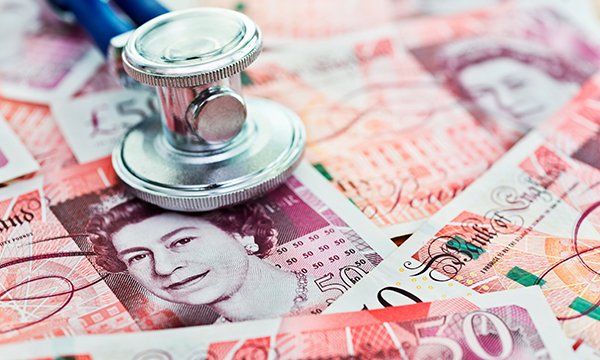stethoscope and cash in sterling