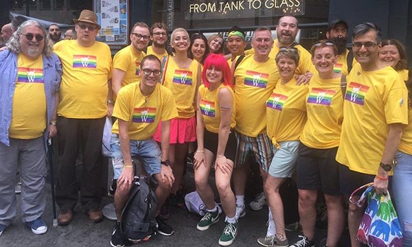 Drew Payne in blue shirt with colleagues from Whittington Health at London Pride