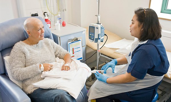 Nurse talking to a patient with cancer