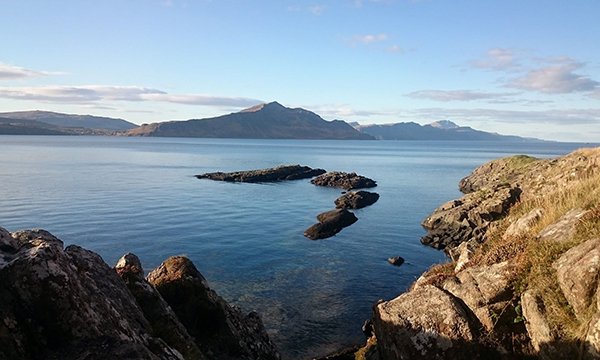 view of sea and mountains from the Scottish island of Rassay, where resident nurses have been appointed after a 10-year absence