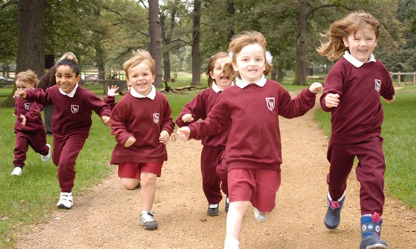 School children running in a park. Picture: Alamy