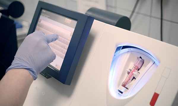 Image of a touch screen point of care testing device for nurses