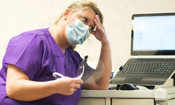 Photo of a nurse feeling unwell