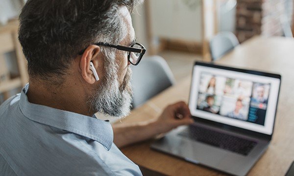 A man looking at a video conference meeting on his computer screen. The COVID-19 pandemic has meant hearings have been held virtually. Picture: iStock