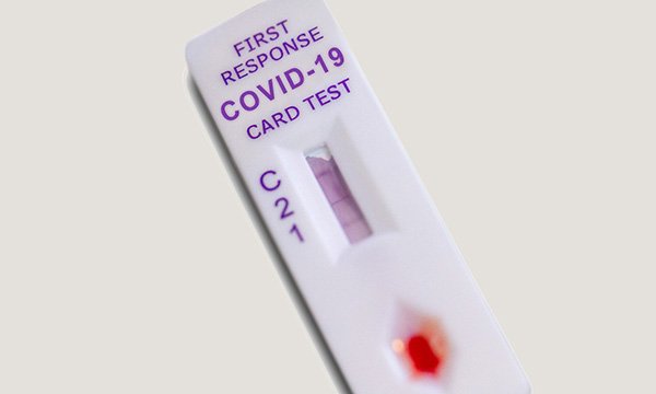 COVID-19 rapid test kits, which are to be offered to all front-line staff in NHS England