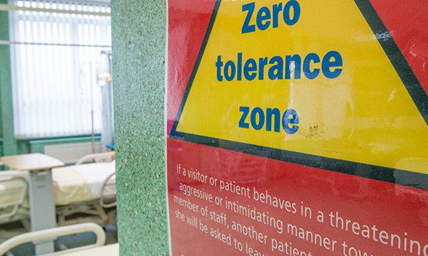 Picture shows a zero tolerance sign in a hospital, warning about the behaviour of patients and visitors