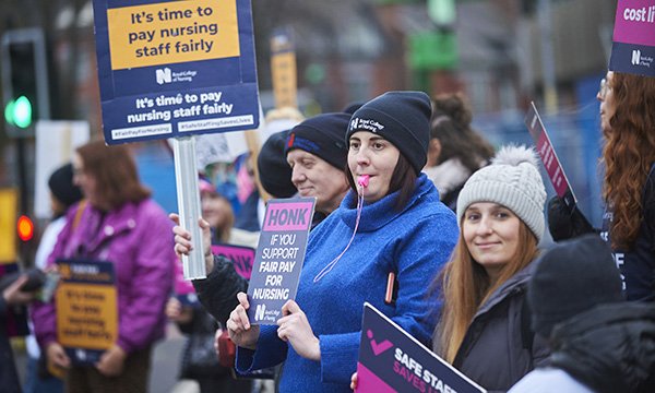 Striking nurses outside the Christie Hospital in Manchester in February 2023