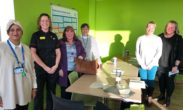 Senior nurse Tara Iles (second from left) with staff at the Southmead Hospital menopause café in Bristol