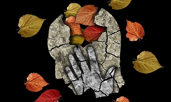 Illustration of a head in profile that is cracked and has autumn leaves tumbling out to illustrate delirium and dementia