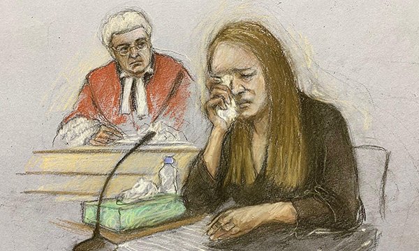 A court artist's sketch of a seated Lucy Letby wiping her eyes while taking the stand as the judge looks on