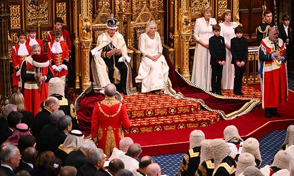 The King delivers his speech to parliament next to the Queen in November 2023