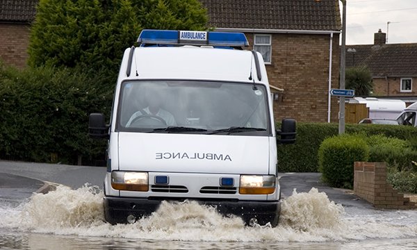 Ambulance in flooded street