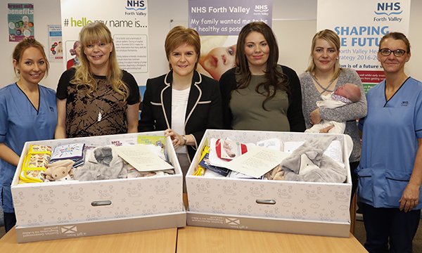 First-time mothers are receiving boxes full of essential items for their babies, which can even serve as their first bed once empty.
