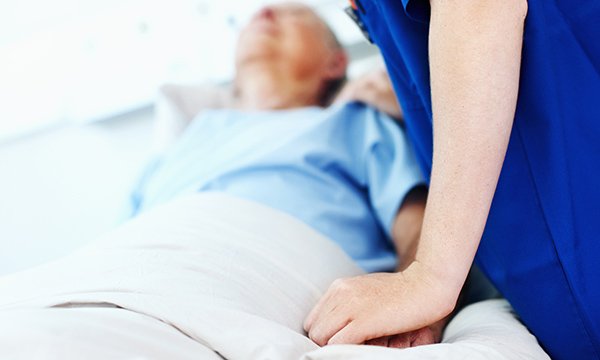 nurse with dying patient