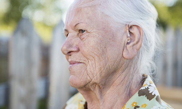 Older woman with a hearing aid