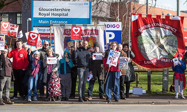 Staff demonstrating outside Gloucestershire Royal Hospital against a plan by the NHS in Gloucestershire to set up a subsidiary company to avoid tax