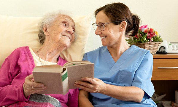 nurse with older patient