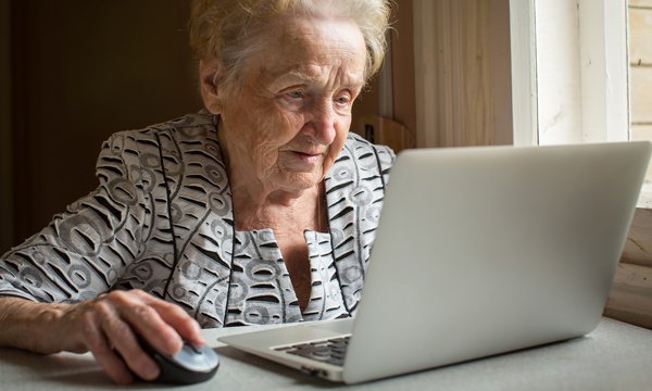 Senior using computer