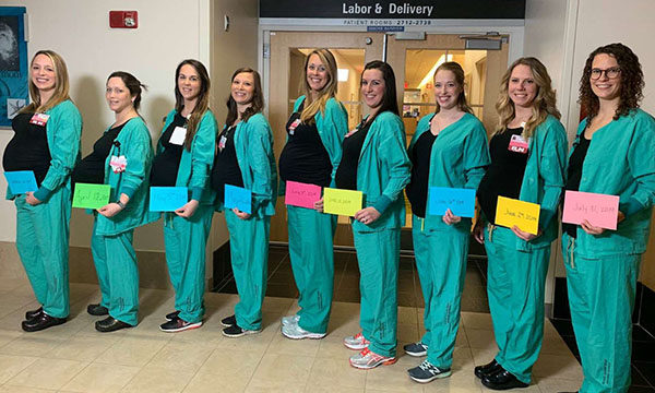 nine pregnant midwives 